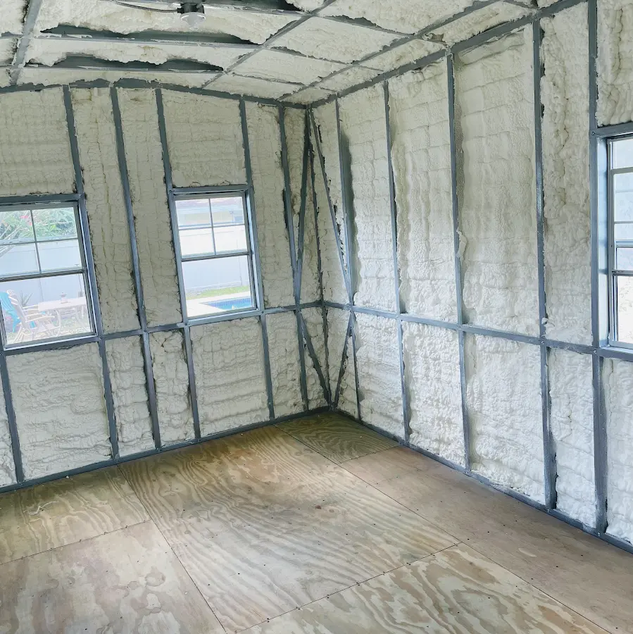 Closed-cell spray foam insulation applied to wall cavities in a residential project in Waycross