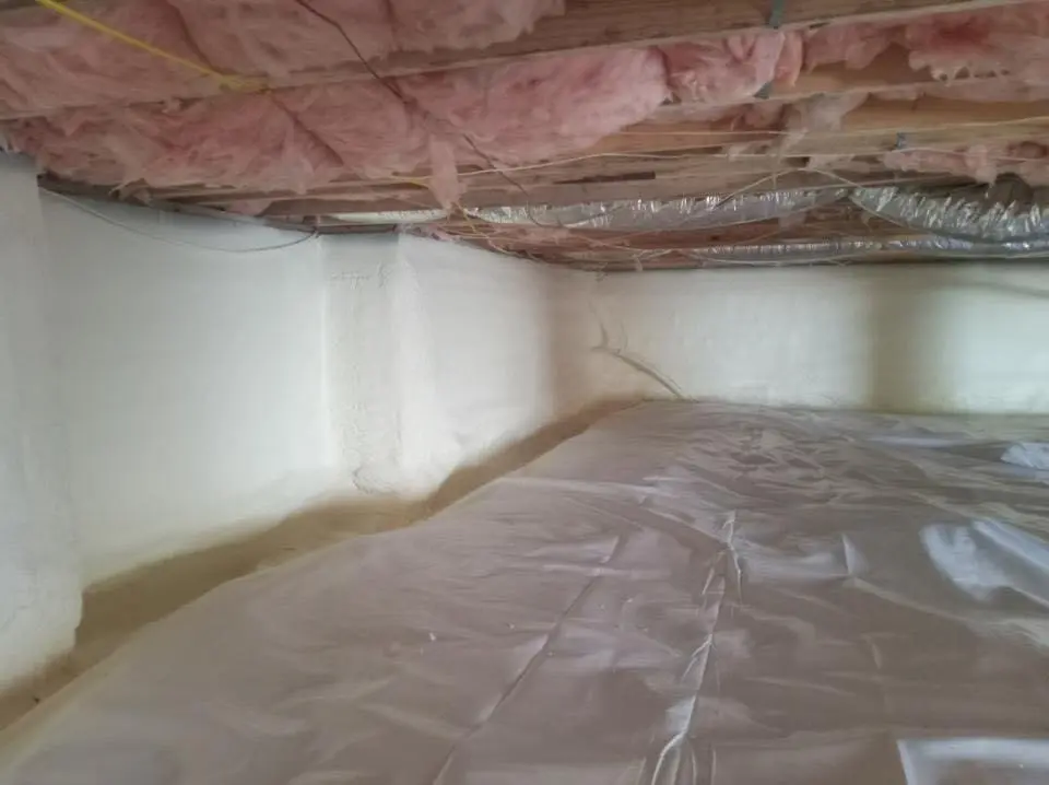Crawl space encapsulation with closed-cell spray foam for Commercial Roof Restoration in Waycross